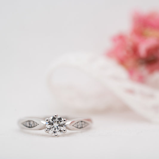 The Celia Ring | Round Moissanite & Diamond Six Prong Accented Engagement