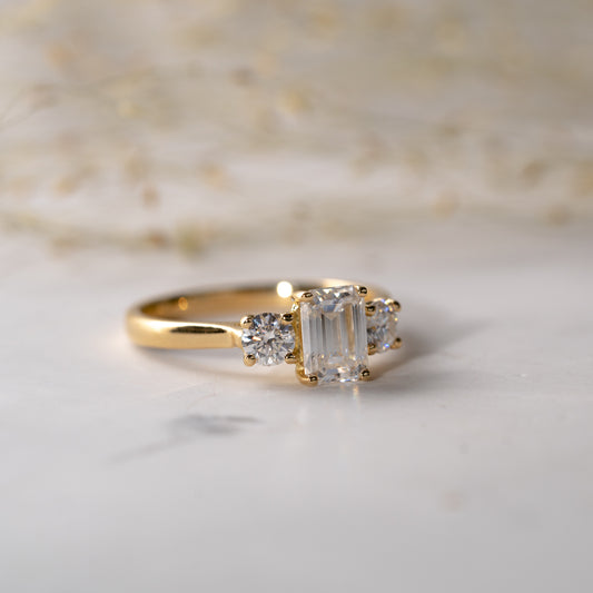 The Maya Ring | Moissanite Emerald & Round Cut Engagement Trilogy