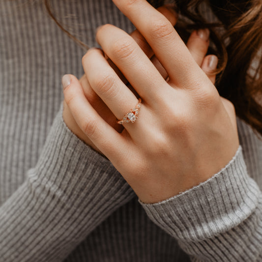 The Theresa Ring | Oval Moissanite & Diamond Accented Nature Inspired Engagement