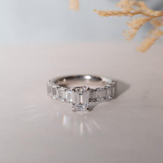 The Angelika Ring | Diamond Emerald Cut Shoulder Set Engagement Solitaire