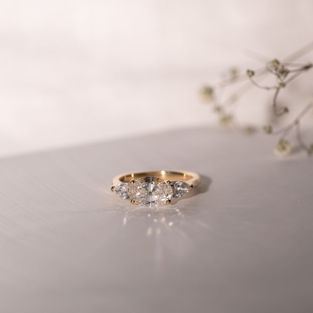 The Claire Ring | Oval & Pear Lab Diamond East West Engagement Trilogy