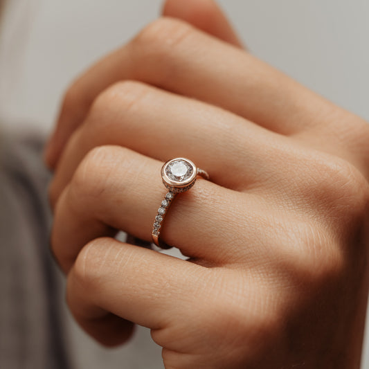 The Ahiya Ring | Moissanite & Diamond Hidden Halo Bezel Shoulder Set Engagement