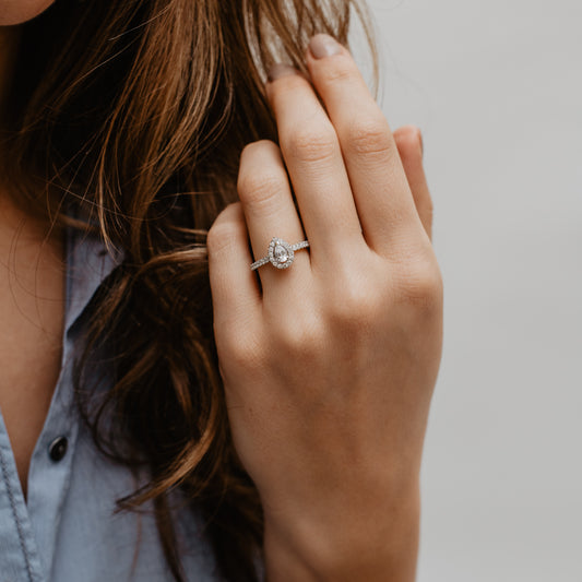 The Amaya Ring | Moissanite & Diamond Pear Cut Engagement Halo