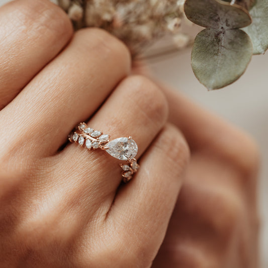 The Jaima Ring | Pear Moissanite & Diamond Leaf Accented Cut Statement