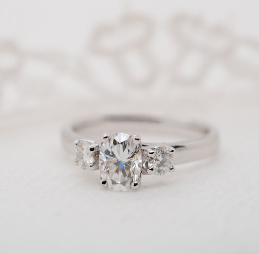 The Madelyn Ring | Moissanite Oval & Round Graduated Engagement Trilogy