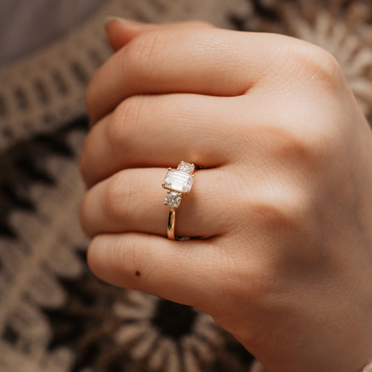 The Maya Ring | Moissanite Emerald & Round Cut Engagement Trilogy
