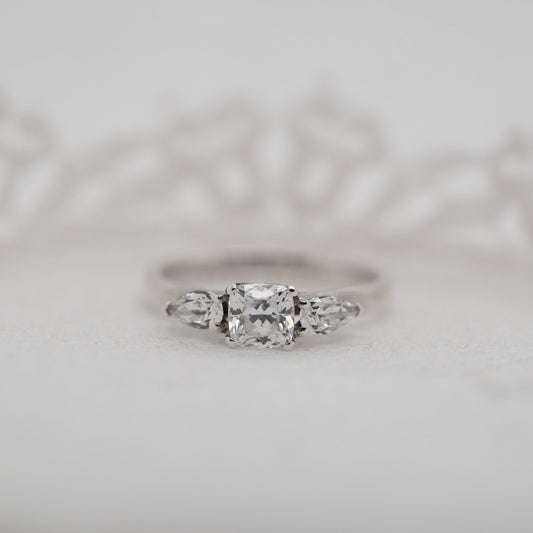 The Mimi Ring | Moissanite Cushion & Pear Crossover Engagement Trilogy