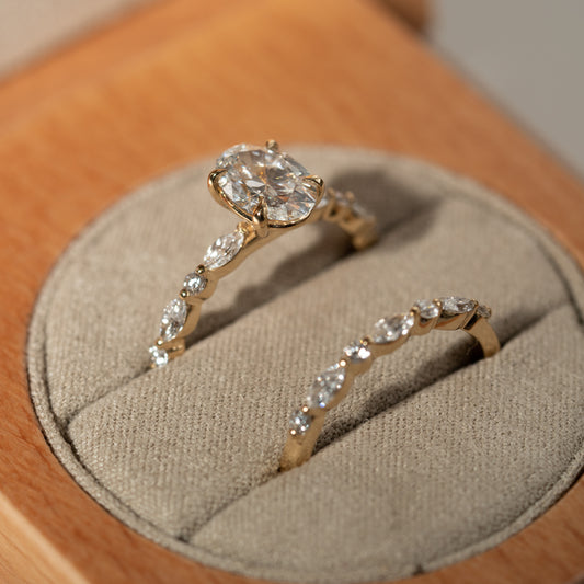 The Nadia Ring | Oval Moissanite & Diamond Marquise Shoulder Set Engagement
