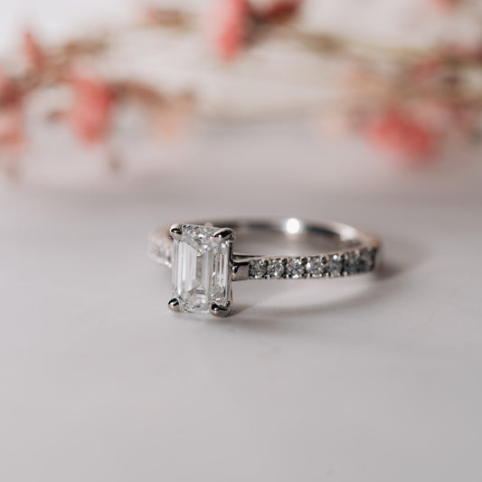 The Nouveau Ring | Moissanite & Diamond Emerald Cut Shoulder Set Engagement