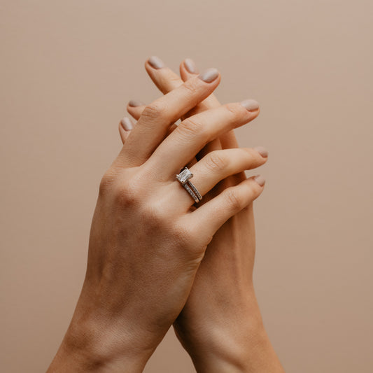 The Nouveau Ring | Moissanite & Diamond Emerald Cut Shoulder Set Engagement