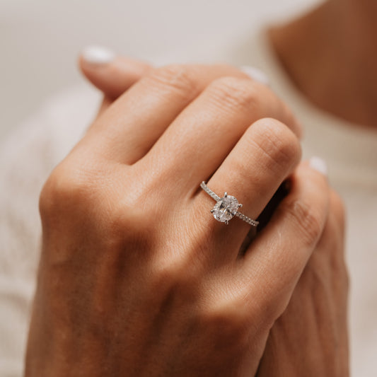 The Nuki Ring | Moissanite & Diamond Oval Hidden Halo Shoulder Set Engagement