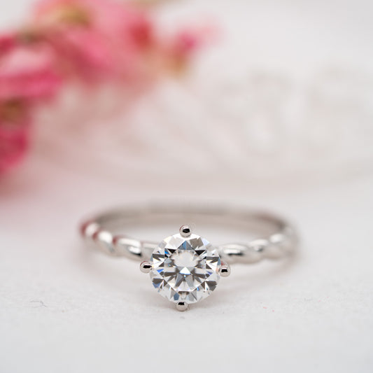 The Ophelia Ring | Round Cut Moissanite Twisted Engagement Solitaire