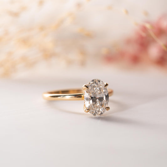 The Sira Ring | Moissanite & Diamond Oval Hidden Halo Engagement Solitaire