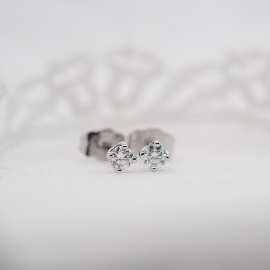 The Solara Earrings | Round Moissanite Four Claw Solitaire Studs