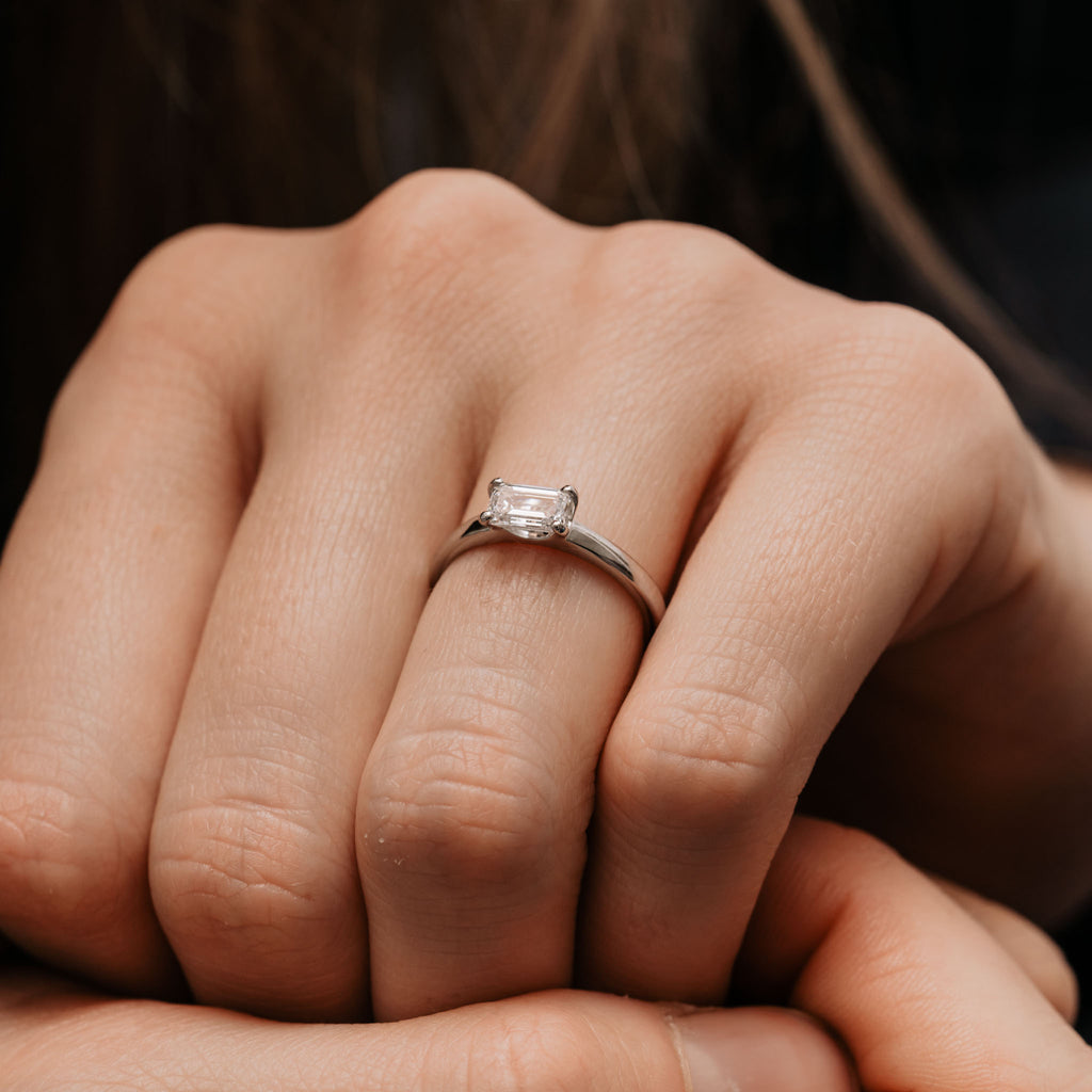 The Tia Ring | Emerald Cut Lab Diamond East West Engagement Solitaire