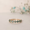 The Jamila Ring | Round Seafoam Green Moissanite Classic Claw Set Band