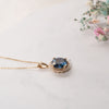 The Ninette Pendant | Round Blue Moissanite & Lab Diamond Halo