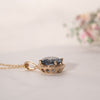 The Ninette Pendant | Round Blue Moissanite & Lab Diamond Halo