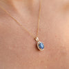 The Ninette Pendant | Round Blue Moissanite & Lab Diamond Halo