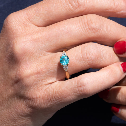The Sophia Ring | 1.98ct Brilliant Cut Paraiba Tourmaline Trilogy 9k Yellow Gold