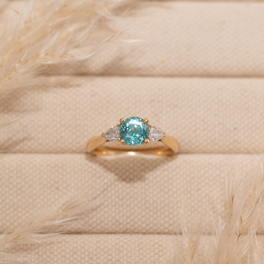 The Sophia Ring | 1.98ct Brilliant Cut Paraiba Tourmaline Trilogy 9k Yellow Gold
