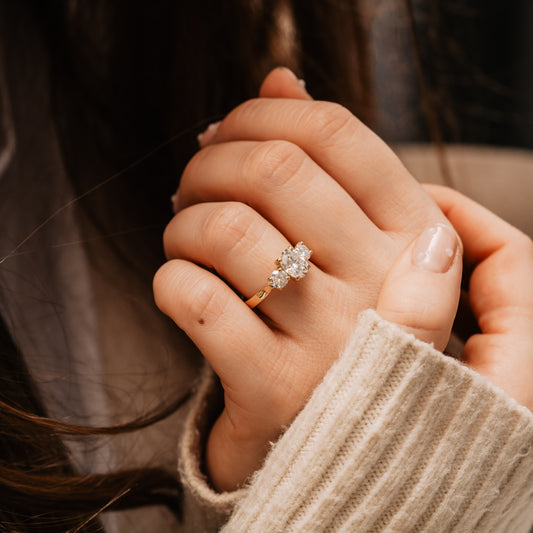 The Tessa Ring | Moissanite Oval & Round Graduated Engagement Trilogy