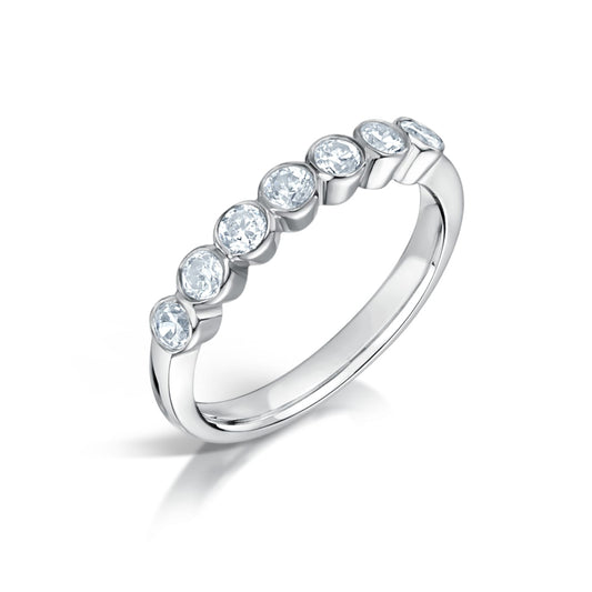 The Cassiel Ring | Lab Diamond Bezel Round Seven Stone